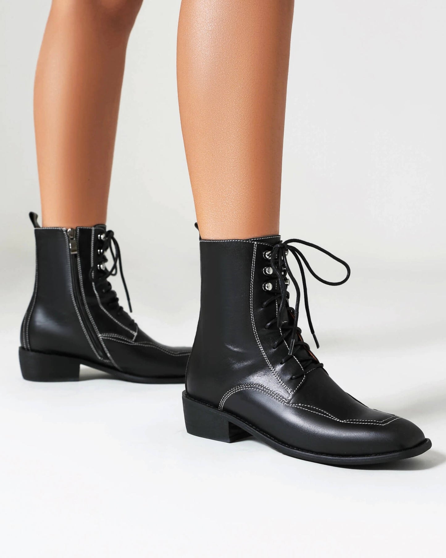 Foria-topstitching-leather-boots-model-2