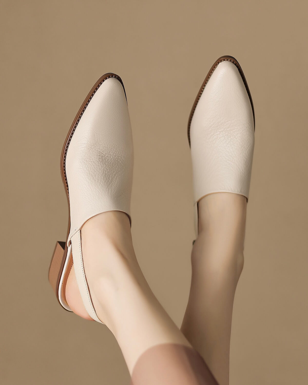 Katy-white-leather-slingback-loafers-model-1