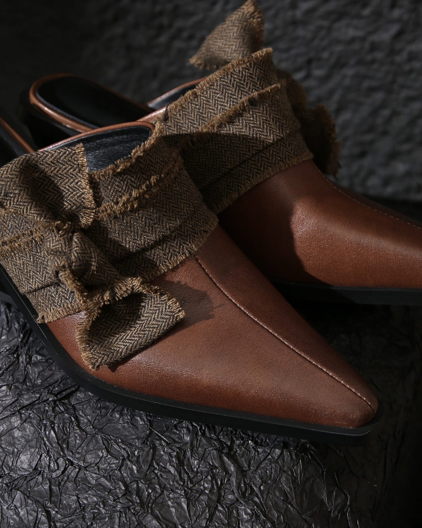 Manda - Mules con adornos de lazo