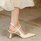 Dessi-asymmetrical-ankle-strap-pumps-white-model-1