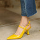 Dessi-asymmetrical-ankle-strap-pumps-yellow-model-1