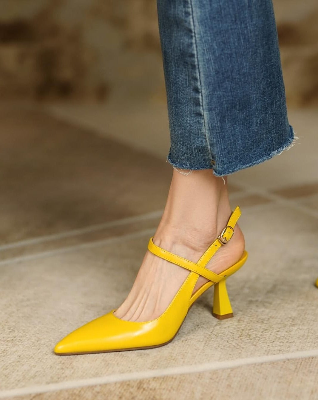 Dessi-asymmetrical-ankle-strap-pumps-yellow-model-1