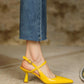 Dessi-asymmetrical-ankle-strap-pumps-yellow-model