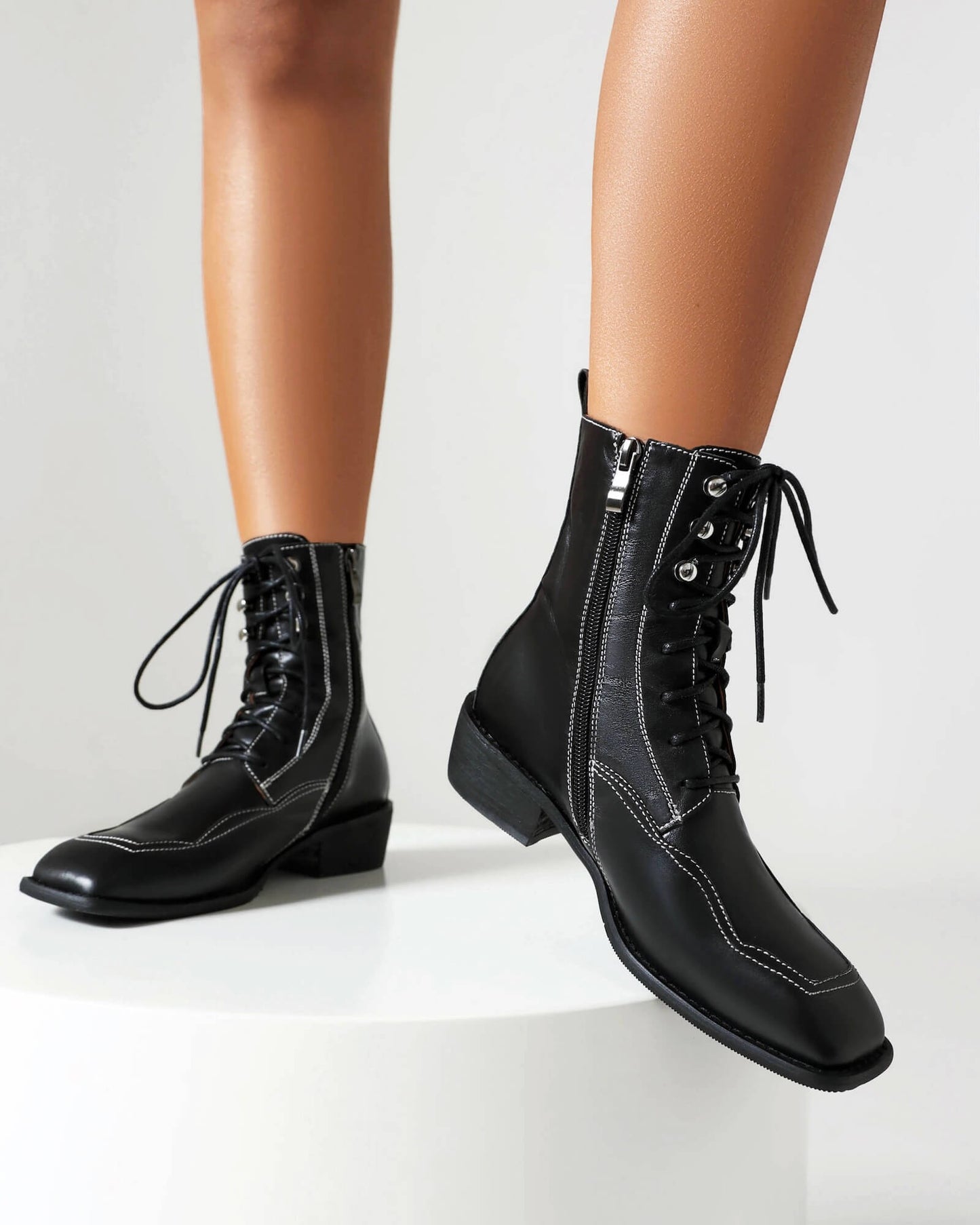 Foria-topstitching-leather-boots-model-1