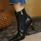 Jene-cube-heeled-boots-black-leather-model-1